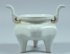 A SMALL CHINESE BLANC-DE-CHINE TWO HANDLED CENSER 3.5ins diameter.