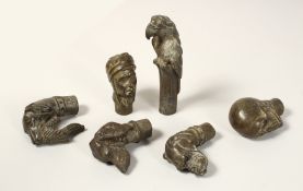 SIX BRONZE WALKING STICKS TOPS.
