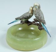 A GOOD CIRCULAR ONYX AND COLD CAST BRONZE PAIR OF BUDGIES.