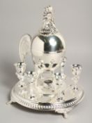 A GOOD CIRCULAR PLATED EGG CRUET with small egg cups and egg tureen.