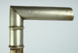 A VICTORIAN TWISTED BRIAR WALKING STICK with plate handle engraved 'William Robinson Esq.