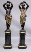 A SUPERB PAIR OF PERIOD ITALIAN CARVED PAINTED AND GILDED BLACKAMOOR FIGURES ON STANDS 6ft 2ins high
