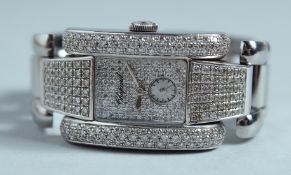 A SUPERB CHOPARD DIAMOND SET WRISTWATCH 
