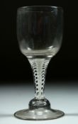A LARGE GEORGIAN WINE GOBLET with white opaque stem, bowl 6.5cm deep, 16cm high.