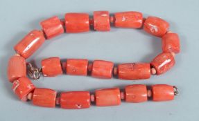 A CORAL NECKLACE.