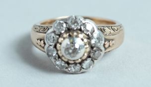 A VICTORIAN DIAMOND SET CLUSTER RING.