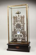 A LARGE CATHEDRAL BRASS AND ENAMEL MOON FACED SKELETON CLOCK striking on a single bell. 21ins high