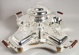 A SUPERB LARGE PLATED LAZY SUSAN with tureens, four vegetable dishes, cruet, salt and pepper and