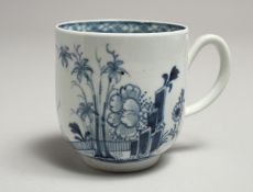 A CHRISTIANS LIVERPOOL COFFEE CUP painted with a fence, a tree and billboard rocks in Chinese