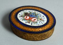A SMALL GILT METAL OVAL PATCH BOX with enamel top. 2ins long.
