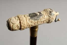 A BONE HANDLED WALKING STICK CARVED AS A SAILING SHIP. 35ins long