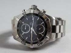 A GENTLEMAN'S STAINLESS STEEL TAG WRISTWATCH. No. CAF2110 in a leather box.