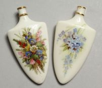 A 19TH CENTURY ROYAL WORCESTER PAIR OF SCENT BOTTLES painted with flowers, one with gold mark