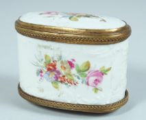 A 19TH CENTURY PORCELAIN DOUBLE ENAMEL BOX painted with flowers with gilt mounts. 3ins long.