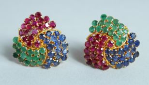 A GOOD PAIR OF MATCHING GOLD, SAPPHIRE, EMERALD AND RUBY EARRINGS.