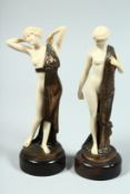 AFTER F. PREISS A PAIR OF PLASTIC AND METAL STANDING NUDES on circular bases Signed, 10.5ins high.