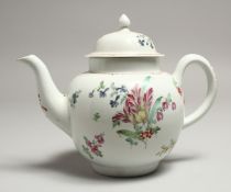 A CHRISTIANS LIVERPOOL TEA POT AND COVER painted with a tulip and other flowers in colour.