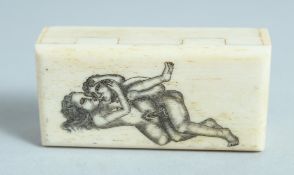 A BONE BOX with folding top, erotic scene. 2.5ins.