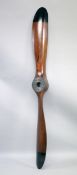 A LARGE WOODEN PROPELLER 6ft long.