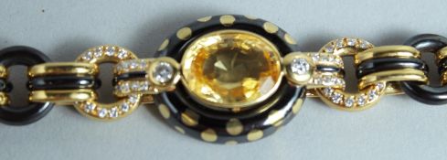 A GOOD FARRONE 18CT GOLD AND ENAMEL SET with a yellow sapphire and diamond.
