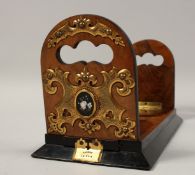 A VICTORIAN BRASS MOUNTED, HICK of BATH, BOOK SLIDE with two ovals of Ashford marble. 13ins long.