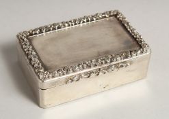 A GOOD WILLIAM IV SILVER TABLE SNUFF BOX, engine turned with fluid border. 3.5ins long, 2.25ins