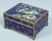 A JAPANESE CLOISONNE ENAMEL BOX AND COVER. 3.5ins long.