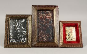 THREE LEATHER PHOTOGRAPH FRAMES