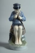 A COPENHAGEN DANISH PORCELAIN FIGURE 