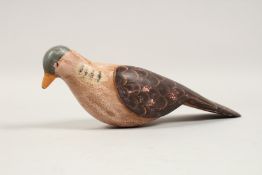 A PAINTED DECOY WOODEN PIGEON. 14ins long.