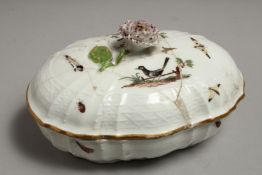 AN 18TH CENTURY MEISSEN OVAL BOX AND COVER painted with birds and flowers. Mark in blue (lid A/F)