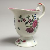 A JOHN PENNINGTON BITING SNAKE PEDESTAL JUG painted with polychrome flowers.