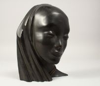 L. MORDZATT, BRUSSELS. A BRONZE MASK. Bears label. 9ins long