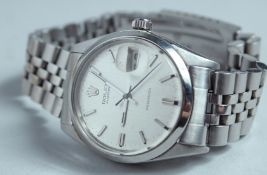 A ROLEX OYSTER DATE WRISTWATCH in a box. NO. 5018.