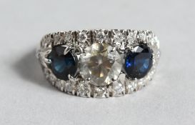 A SUPERB 18CT GOLD, SAPPHIRE AND DIAMOND THREE STONE RING.