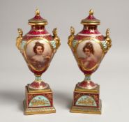 A VERY GOOD PAIR OF 19TH CENTURY VIENNA TWO HANDLED URNS, COVERS AND STANDS painted with