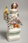 A STAFFORDSHIRE FLAT BACK FIGURE, A GIRL WITH A PARROT. 7ins high.
