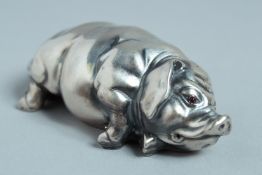 A RUSSIAN SILVER SLEEPING PIG. Mark: Head & 84, eagle, I P and Faberge mark. 7cm long