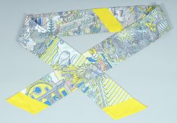 A HERMES LE MAXI - TWILLY SLIM CRAVAT in a box.