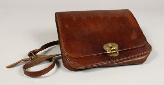 A LEATHER POACHER'S BAG.