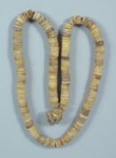 A TIBETAN BONE NECKLACE.