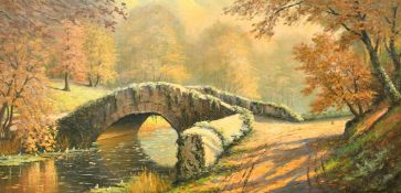 20th Century French school, a stone bridge in an autumnal landscape, oil on canvas, indistinctly