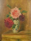 French School circa 1921, a still life of roses in an oriental vase, oil on board, indistinctly