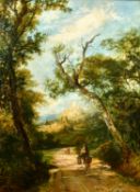 Attributed to E. J. Niemann (1812-1876) British, wayfarers on a country path with castle ruins