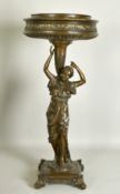 French School, A classical female figure holding aloft a circular bowl standing on a square base, 13