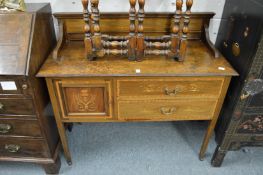 An Edwardian inlaid mahogany washstand.