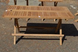 A folding hardwood rectangular garden coffee table
