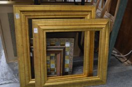 Three frames and a chess board.