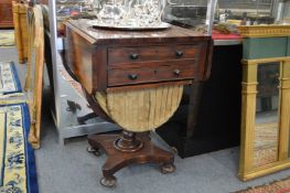 A 19th century mahogany drop flap work table.