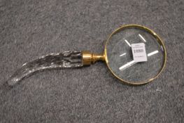 A decorative magnifying glass.